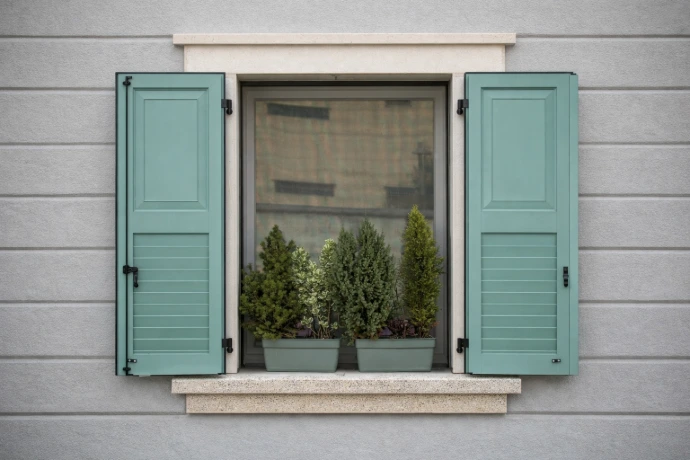 Foto de la ventana de una casa con repisa de Plamar